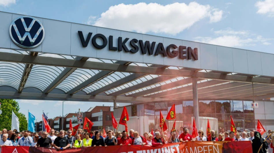 Workers reeling after VW cuts open door to factory closures