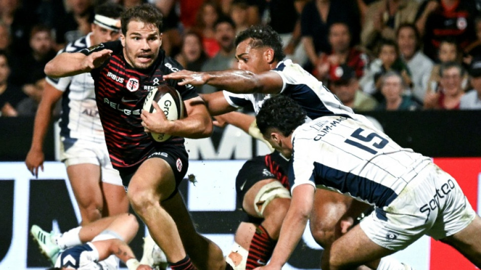 Dupont scores twice to send Toulouse to Top 14 summit