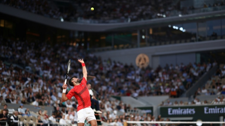 Djokovic races into French Open fourth round