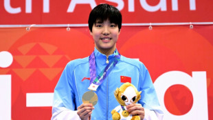China swim sensation, 13, sets Games record after Japan win early