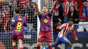 Atletico resist Barca comeback to reach Champions League semis