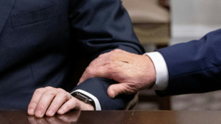 White House blames Trump's bandaged hand on handshakes