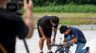 Taiwan students design drones for mock battle, as China threat looms