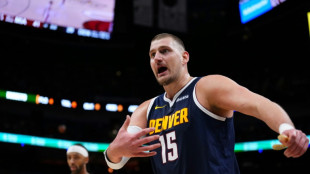 Nuggets suffer Jokic injury scare in Heat drubbing
