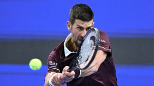 Djokovic grinds out opening-round win at China Open