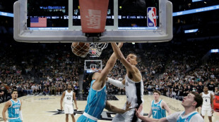 Lakers edge Nuggets in OT while Wemby sparks Spurs win