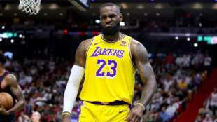 Calf injury sidelines Lakers' James