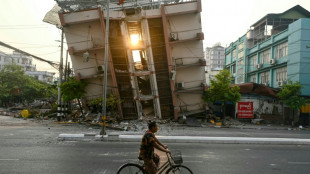 Myanmar gedenkt der Erdbebenopfer - Frau am vierten Tag aus Trümmern gerettet