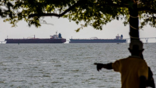 Most Asian markets track Wall St lower as AI fears mount