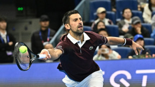 Djokovic survives China Open scare against wildcard world no. 104