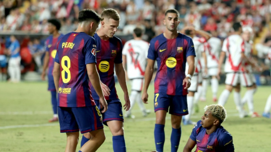 First slip for champions Barca in Rayo draw