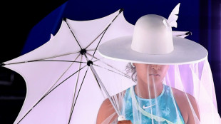 Osaka says 'I'm a little strange' after Melbourne fashion statement