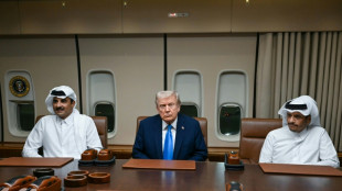 Trump makes Qatar stop en route to Asia summits, Xi talks
