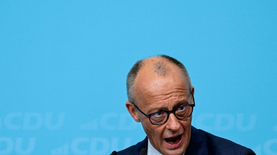 Germans vote in elections threatening fresh blow to Merz