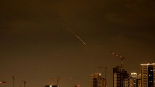 Iran fires missile salvo after Trump signals progress in talks