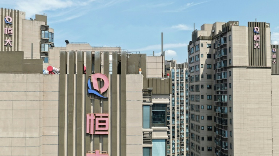 Founder of China's Evergrande pleads guilty to fraud