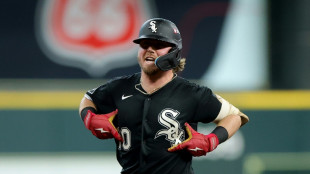 Meidroth blasts White Sox through, Phillies survive in MLB playoffs