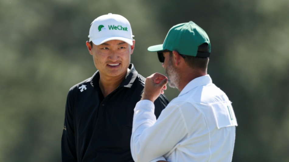 China's Li flushes toilet trouble at Masters